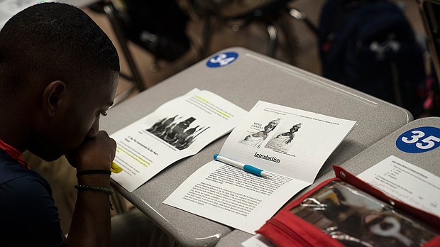 A student in Baltimore looks over his notes during an AP African American Studies course last year.
Mandatory Credit:	Michael Robinson Chavez/The Washington Post/Getty Images