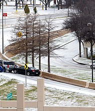 As hundreds of thousands remain without power in Texas amid frigid temperatures and icy roads, the Northeast is bracing for a blast of bitterly freezing air that forecasters say could be the coldest felt in decades, and pictured, vehicles stuck on an exit ramp of US 75 in Dallas, Texas, on Feb 1.
Mandatory Credit:	Smiley N. Pool/Liesbeth Powers/The Dallas Morning News/AP