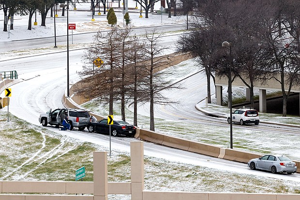 As hundreds of thousands remain without power in Texas amid frigid temperatures and icy roads, the Northeast is bracing for a blast of bitterly freezing air that forecasters say could be the coldest felt in decades, and pictured, vehicles stuck on an exit ramp of US 75 in Dallas, Texas, on Feb 1.
Mandatory Credit:	Smiley N. Pool/Liesbeth Powers/The Dallas Morning News/AP