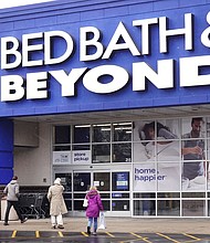 Bed Bath and Beyond is closing another 87 stores as the struggling retailer barrels toward bankruptcy, and pictured, customers shop at a Bed Bath & Beyond store on January 5, in Forest Park, Illinois.
Mandatory Credit:	Scott Olson/Getty Images