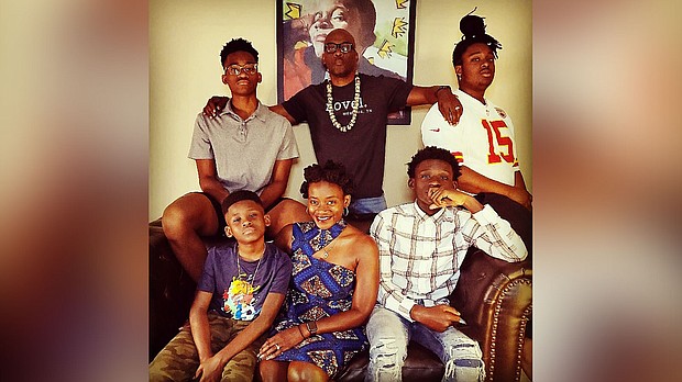 Author Derrick Barnes, center top, and his family.
Mandatory Credit:	Courtesy Derrick Barnes