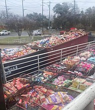 Food discarded from an H-E-B store after a power outage is rotten and unsafe to eat, officials said.
Mandatory Credit:	From George Morales III/Facebook