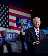 President Joe Biden speaks at the Democratic National Committee meeting in Philadelphia on February 3.
Mandatory Credit:	Patrick Semansky/AP