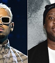 Chris Brown apologizes to Robert Glasper for online outburst after he lost the Grammy for best R&B album to Glasper.
Mandatory Credit:	Getty