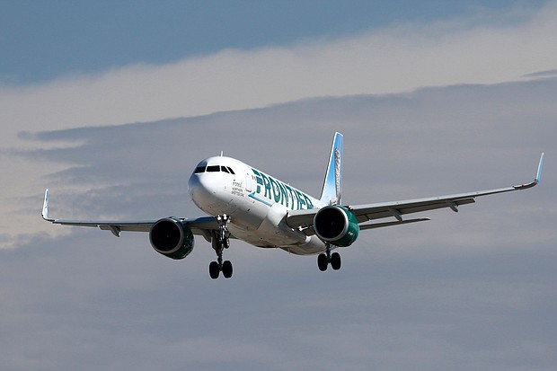 An Airbus A320neo jetliner belonging to Frontier Airlines, lands at Harry Reid International Airport in Las Vegas, Nevada, in February 2022. Frontier Airlines has announced its newest incentive to get travelers back in the air post-pandemic.
Mandatory Credit:	Larry MacDougal/MCDOL/AP