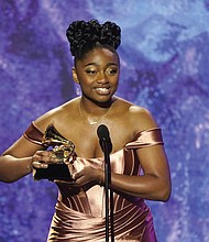 Samara Joy accepts the award for best jazz vocal album for “Linger Awhile” at the Grammy Awards.