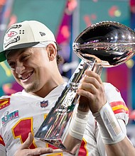 Patrick Mahomes holds the Lombardi Trophy after winning Super Bowl LVII in Glendale, Arizona, on February 12.
Mandatory Credit:	Matt Slocum/AP