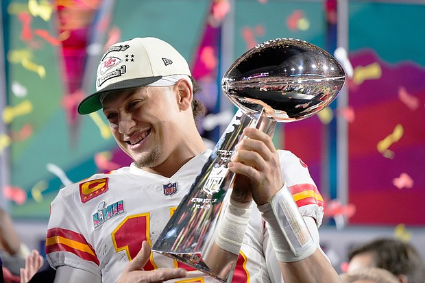 Patrick Mahomes holds the Lombardi Trophy after winning Super Bowl LVII in Glendale, Arizona, on February 12.
Mandatory Credit:	Matt Slocum/AP