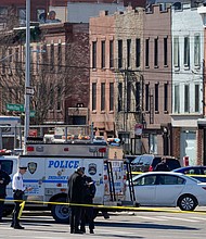 Police gather in New York on Monday where a rental truck was stopped and the driver arrested.
Mandatory Credit:	John Minchillo/AP