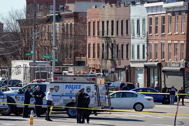Police gather in New York on Monday where a rental truck was stopped and the driver arrested.
Mandatory Credit:	John Minchillo/AP