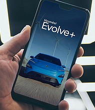 Users can reserve Hyundai electric vehicles using a smartphone app.
Mandatory Credit:	Courtesy Hyundai