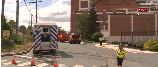 Mars Wrigley is fined after two workers fell into a tank of chocolate at its Pennsylvania factory last June. This image shows first responders at the Mars Wrigley plant in Elizabethtown in June after the incident.
Mandatory Credit:	WGAL