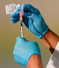 People are age 65 are not becoming severely ill and overwhelming hospitals, even though a small percentage of them have gotten the new Covid-19 booster.
Mandatory Credit:	Mary Altaffer/AP