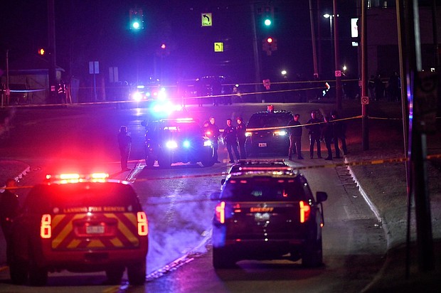 Police work the scene where a man suspected of a shooting on the Michigan State University campus February 14, in Lansing.
Mandatory Credit:	Nick King/Lansing State Journal/USA Today