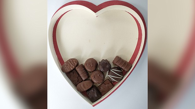 Edgar Dworsky removed all of the packaging from inside of the Whitman's Sampler chocolate box and saw that the chocolate pieces only filled about one-third of the box.
Mandatory Credit:	Consumer World