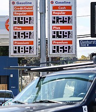 Inflation was still hot in January. Gas prices are displayed at a 76 gas station on February 13, in Los Angeles.
Mandatory Credit:	Mario Tama/Getty Images