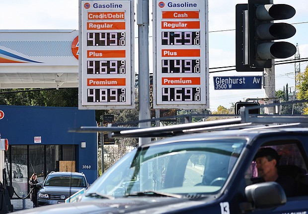 Inflation was still hot in January. Gas prices are displayed at a 76 gas station on February 13, in Los Angeles.
Mandatory Credit:	Mario Tama/Getty Images