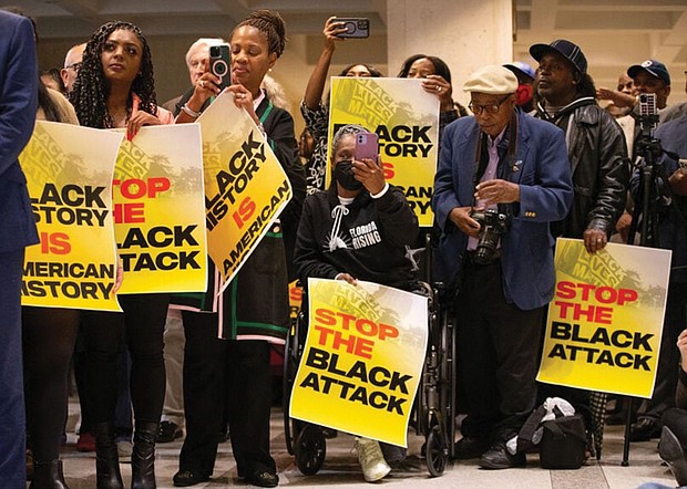 A large crowd gathers last month on the fourth-floor rotunda of the Florida Capitol in Tallahassee for the “Stop the Black Attack” rally. Attorney Ben Crump threatened to file a lawsuit against Gov. Ron DeSantis and his administration amid the ban of a proposed Advanced Placement course on African-American studies in Florida high schools on behalf of three Leon County, Fla., school students.