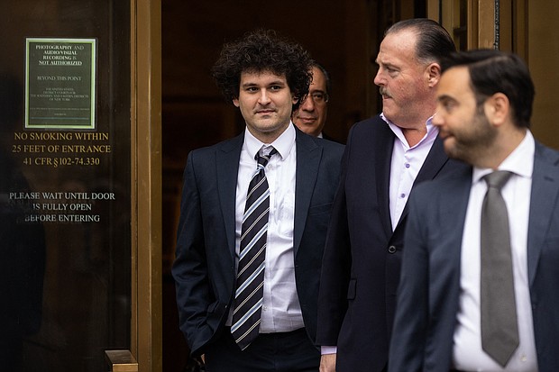 FTX founder Sam Bankman-Fried (L), here on February 9, is set to appear in New York federal court Thursday for the second time this week  as prosecutors seek stricter bail rules.
Mandatory Credit:	Yuki Iwamura/AFP/Getty Images
