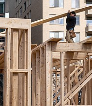 US home building fell again in January. In this file image from January 18, construction workers build a residential house in Bethesda, Maryland.
Mandatory Credit:	Saul Loeb/AFP/Getty Images