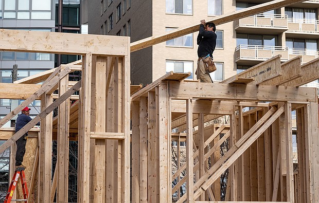 US home building fell again in January. In this file image from January 18, construction workers build a residential house in Bethesda, Maryland.
Mandatory Credit:	Saul Loeb/AFP/Getty Images
