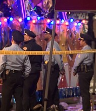 Police said five people were shot along a Mardi Gras parade route in New Orleans. A suspect is in custody.
Mandatory Credit:	WDSU