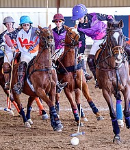 Wendy Stover playing for Herk's Store & Grill in front of the pack at Legends Polo Club 2022 Texas Arena League photo - Murrell Photography