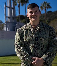 Lt. j.g. Patrick Elmer/Photo by Lt. Cmdr. Ryan Murtha, Navy Office of Community Outreach