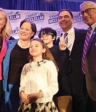 After delivering her victory speech in becoming Virginia’s first Black congresswoman Tuesday, state Sen. Jennifer L. McClellan, second from left, is surrounded by Rep. Abigail Spanberger, 7th District, her two children, Jackson,12, Samantha, 7, her husband, David Mills, and Rep. Bobby Scott, 3rd District.