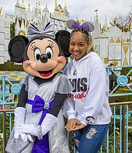 Award-winning singer and radio show host Erica Campbell shares a magical moment with Minnie Mouse in front of “it’s a small world,” before taking the stage as the headlining talent of “Celebrate Gospel” at Disneyland Park in Anaheim, Calif., on Feb. 25, 2023. “Celebrate Gospel” is part of Celebrate Soulfully at Disneyland Resort, where guests are invited to join a soulful celebration of Black heritage and culture through experiences, music, food and more. (Christian Thompson/Disneyland Resort)
