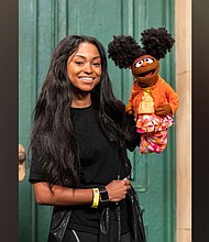 In 2021, Megan Piphus Peace joined "Sesame Street" as a full-time cast member, becoming the first Black female puppeteer in the show's history.
Mandatory Credit:	Zach Hyman/Sesame Workshop