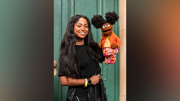 In 2021, Megan Piphus Peace joined "Sesame Street" as a full-time cast member, becoming the first Black female puppeteer in the show's history.
Mandatory Credit:	Zach Hyman/Sesame Workshop