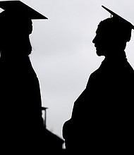 President Joe Biden's student loan forgiveness plan goes before the Supreme Court Tuesday. New graduates line up before the start of a community college commencement in East Rutherford, N.J., in 2018.
Mandatory Credit:	Seth Wenig/AP