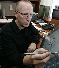 Andrews McMeel Universal, the company that syndicates "Dilbert," drops Scott Adams, creator of Dilbert, over his racist remarks. Adams is pictured here in his studio in in Dublin, California in 2006.
Mandatory Credit:	Marcio Jose Sanchez/AP
