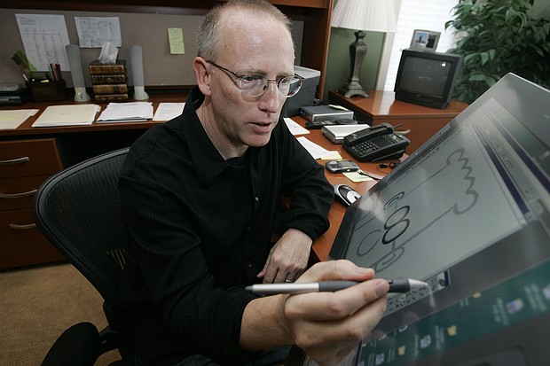 Andrews McMeel Universal, the company that syndicates "Dilbert," drops Scott Adams, creator of Dilbert, over his racist remarks. Adams is pictured here in his studio in in Dublin, California in 2006.
Mandatory Credit:	Marcio Jose Sanchez/AP
