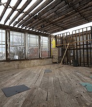 Members of the news media recently toured William Fox Elementary School more than a year after a late-night fire started in the Fan District school’s roof on Friday, Feb. 11, 2022. Hard hats were required to walk the charred, water-damaged halls of the school on Feb. 22. Built in 1911, school officials estimate it will take at least two years to rebuild and reopen the beloved Hanover Avenue neighborhood school.