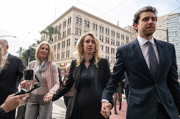 Theranos founder Elizabeth Holmes (C), here in San Jose, in 2022, gave has given birth to her second child, according to a court filing last week.
Mandatory Credit:	Amy Osborne/AFP/Getty Images