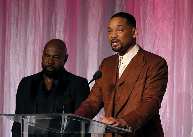 Honorees Antoine Fuqua (left) and Will Smith accept The Beacon Award for "Emancipation" onstage during the 14th Annual AAFCA Awards on Wednesday.
Mandatory Credit:	Jemal Countess/Getty Images