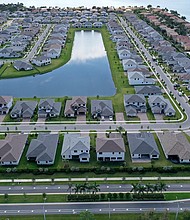 The gap between Black homeownership rates and that of any other race or ethnic group is even larger now than in 2011. Pictured is a residential neighborhood in 2022 in Miramar, Florida.
Mandatory Credit:	Joe Raedle/Getty Images