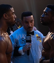 Director-star Michael B. Jordan (left) squares off with Jonathan Majors (right) in "Creed III."
Mandatory Credit:	Eli Ade/Metro-Goldwyn-Mayer Pictures