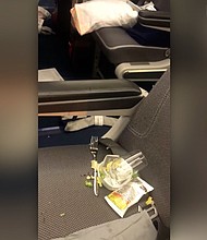 Zimmerman, who is five months pregnant, talked to CNN about what she witnessed. She said dinner service was going on during the turbulence.
Mandatory Credit:	Susan Zimmerman