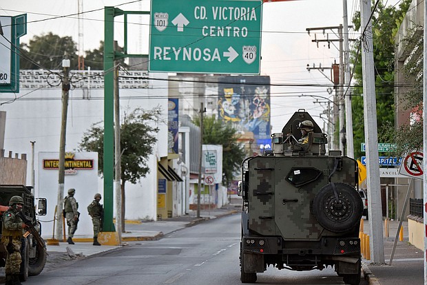 The FBI is seeking the public's help in locating the four Americans kidnapped in Matamoros, Mexico, on Friday. Pictured are members of the National Guard in the border city of Matamoros, Mexico, in 2021.
Mandatory Credit:	Alfredo Estrella/AFP/Getty Images/File