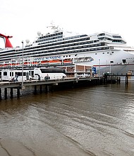 The woman was found unresponsive during the ship's February 27 voyage to Nassau, Bahamas, according to the FBI. Pictured is a Carnival Sunshine cruise ship in Charleston, South Carolina, in March 2020.
Mandatory Credit:	Mic Smith/AP/File
