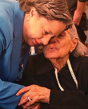 Rep. Jennifer L. McClellan has a quiet moment with her mother, Lois McClellan, 90, of Petersburg who joined her daughter during a brief time when family, friends and staff members could all gather to celebrate prior to the official swearing-in ceremony on Capitol Hill.