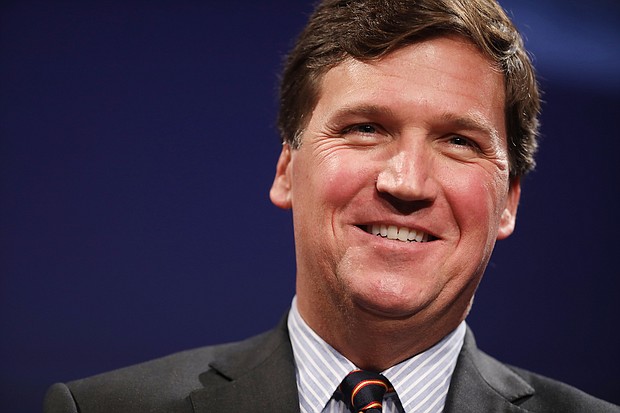 A lawyer representing one of five Proud Boys members asked a federal judge to throw out the case, saying that federal prosecutors hid "plainly exculpatory" US Capitol security footage played on Fox News host Tucker Carlson's show.
Mandatory Credit:	Chip Somodevilla/Getty Images