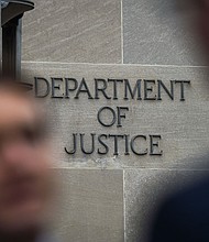 A Michigan man has been charged with unlawfully owning several firearms after federal agents uncovered online death threats he allegedly made against Gov. Gretchen Whitmer and President Joe Biden.
Mandatory Credit:	Chandan Khanna/AFP/Getty Images/FILE