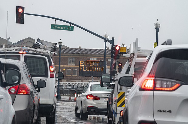 A flooding sign on the Embarcadero during a rain storm in San Francisco, California, on Thursday.
Mandatory Credit:	David Paul Morris/Bloomberg/Getty Images