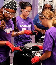 Violet Vortex – The ComEd EV Rally girls teenage girls ages 13-18 an opportunity to build an electric car they will race. It is an opportunity for them to get exposure to Science, Technology, Engineering, Arts and Mathematics (STEAM). Photo provided by ComEd.
