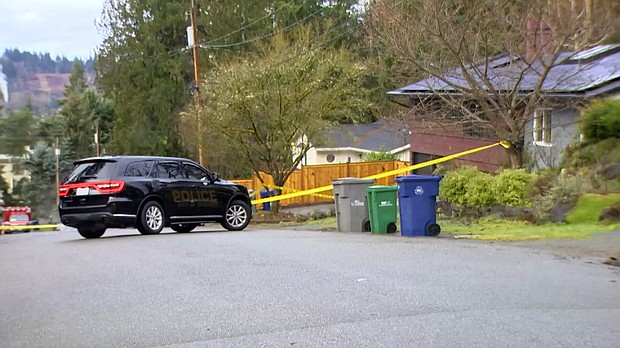 Authorities cordon off the scene of a fatal shooting in Redmond, Washington, on Friday. A husband and wife were killed by a gunman who then killed himself, police say.
Mandatory Credit:	KOMO
