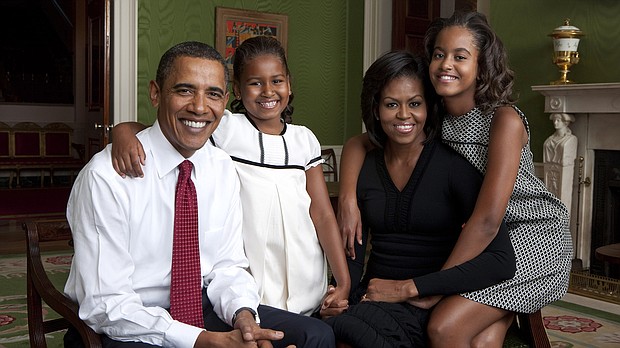 Former first lady Michelle Obama, 2nd right, said her family felt an enhanced sense of responsibility during their time in the White House as the first Black first family in American history.
Mandatory Credit:	Annie Leibovitz/The White House/Getty Images